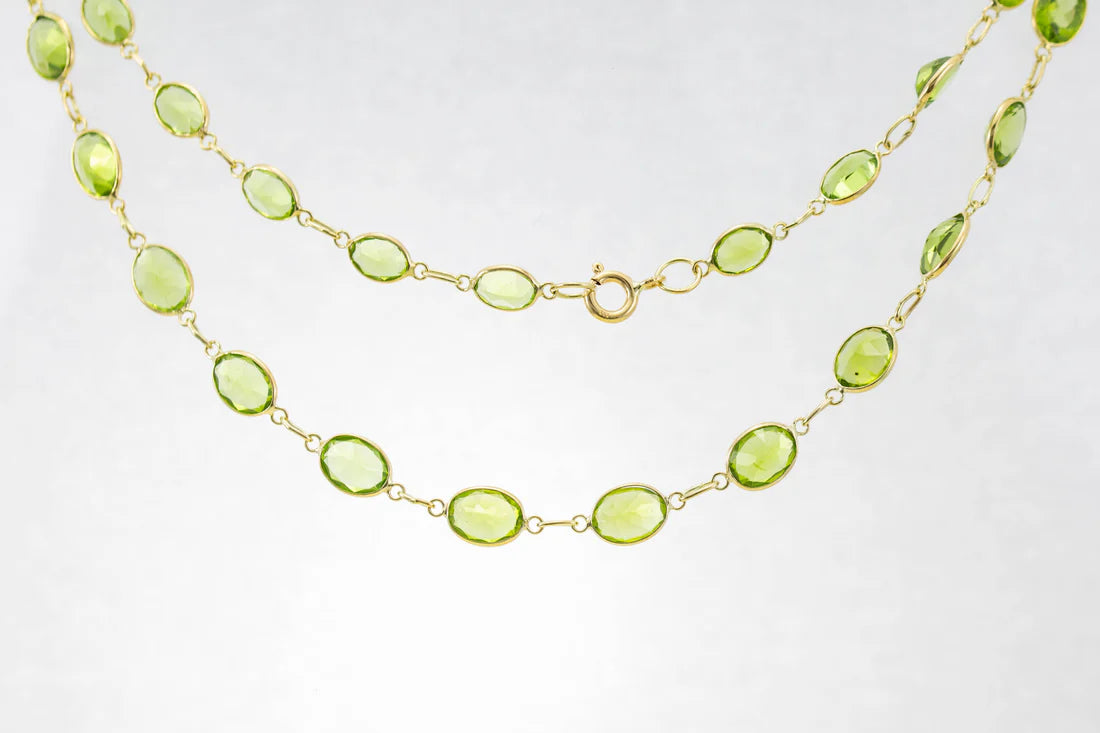 Modern Pendant Necklaces-9ct Yellow Gold Peridot Graduated Line Necklace