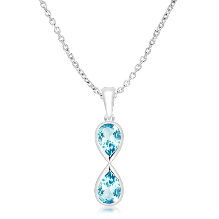 Designer Silver Pendant Necklaces-Unique & Co Sterling Silver Blue Topaz Pendant Necklace